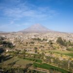 Agricultural landscape and the rustic Misti Volcano in the background