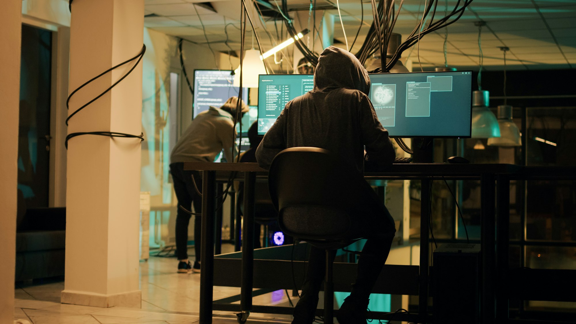 Woman hacker planning phishing and espionage at night